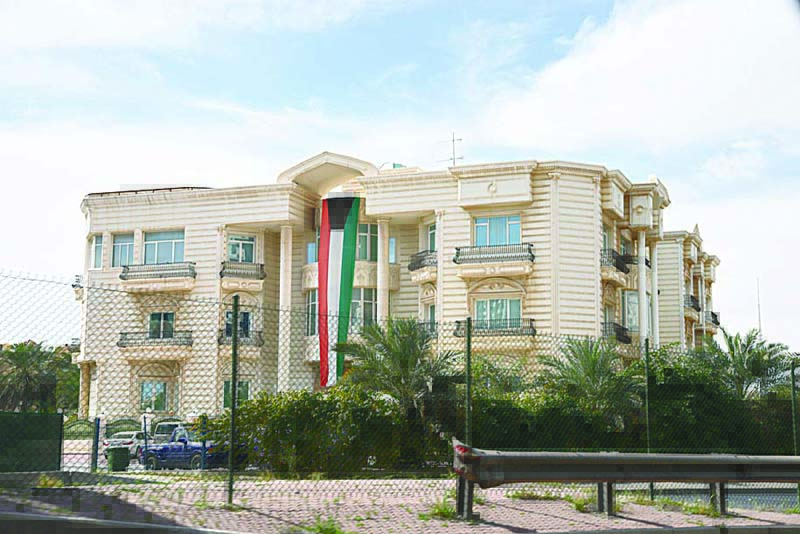 Kuwait celebrates with flags, portraits of leaders