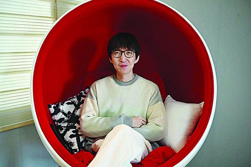This picture shows Joshua Ahn, CEO of South Korean production company Starfish Entertainment, posing during an interview with AFP at his home in Seoul.
