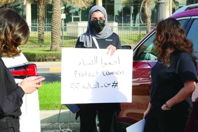 Women protest demanding more protection for females in Kuwait