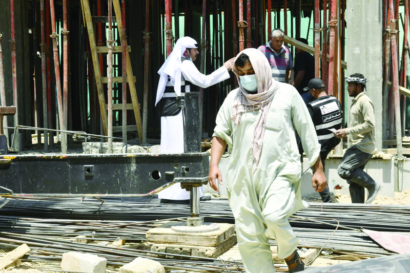 Up to 1,502 laborers forced to work in Kuwait's scorching heat since June 1