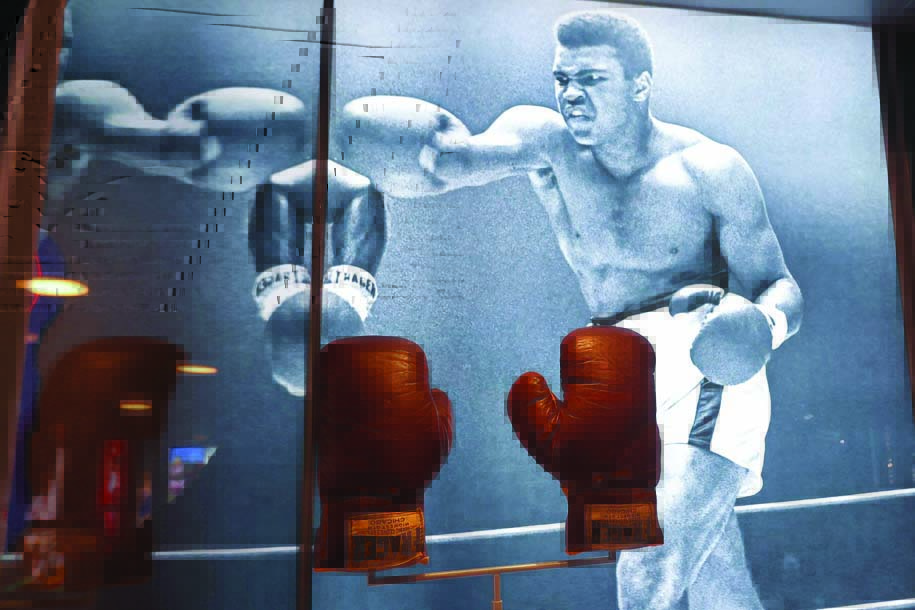 Gloves worn by late boxing giant Mohammed Ali, when he won a gold medal at the 1960 Rome Olympics, are on display.