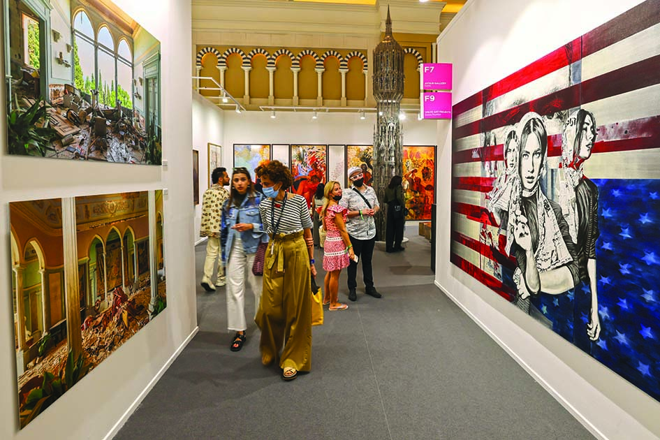 People visit the 15th edition of Art Dubai at Madinat Jumeirah in the Gulf emirate of Dubai.<br>