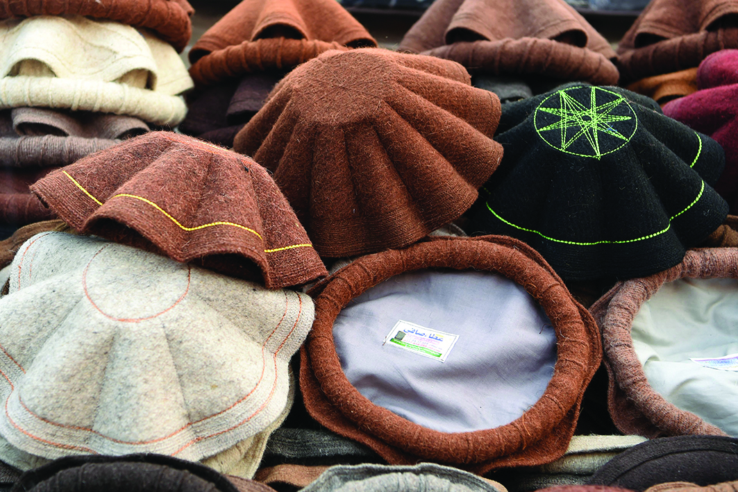 Pakol hats are on display for sale at a stall in a market near the Pul-e Khishti Mosque in Kabul. <br>