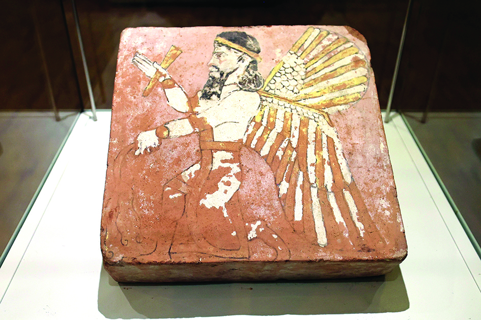 A picture shows a Boukan glazed brick repatriated from Switzerland on display.