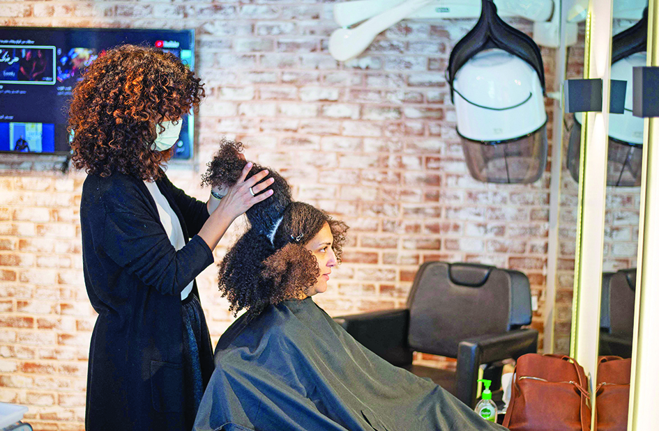 Rola Amer, hairstylist at the