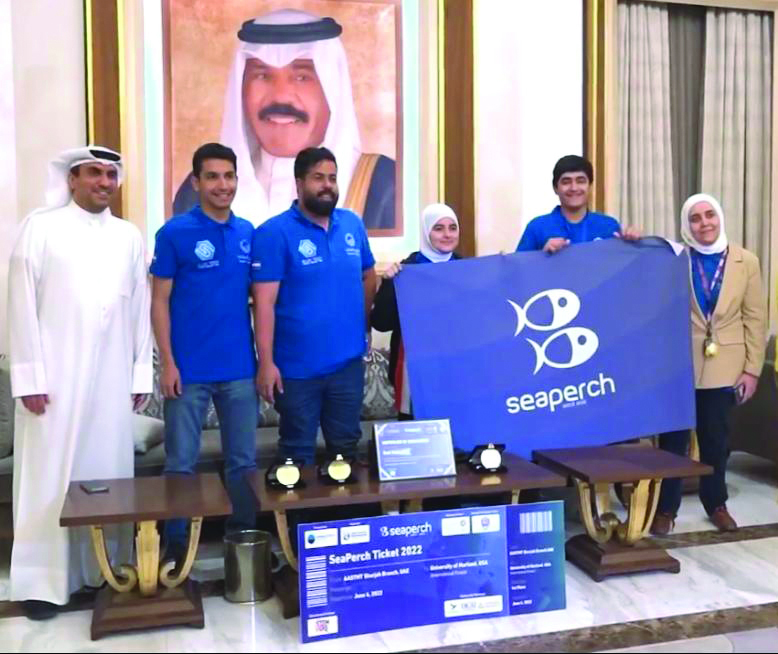 Members of the Kuwaiti Team Blue Tech Youth Valley pose with their ticket to the International SeaPerch Challenge.