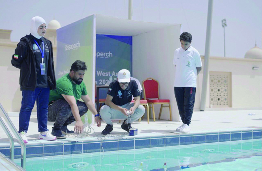 Members of the Kuwaiti Team Blue Tech Youth Valley in action.