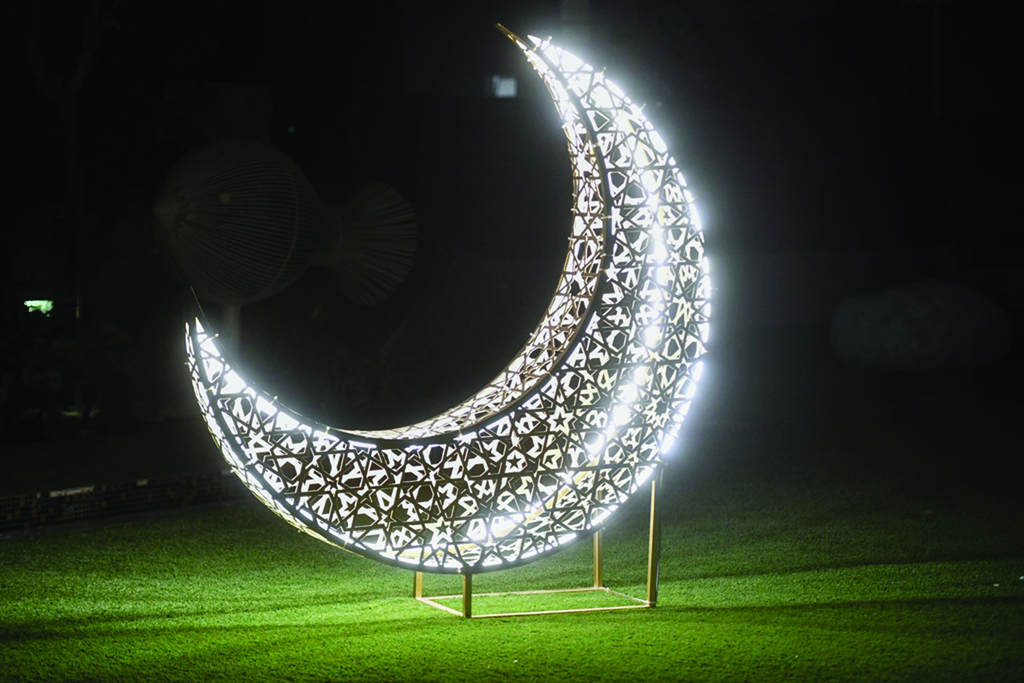 Crescents, stars adorn households in Kuwait celebrating Ramadan nights