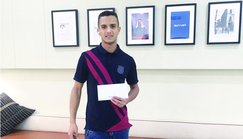 Hosam Hassan poses with the award.