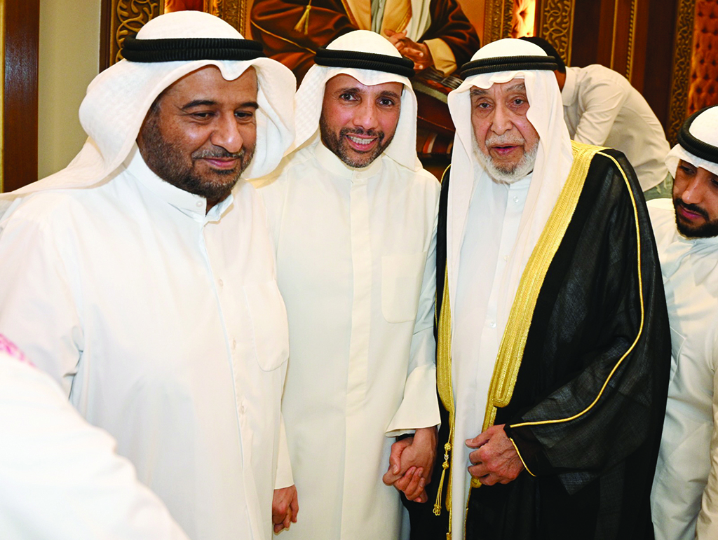Marzouq Al-Ghanem with Khaled Al-Mathkour.