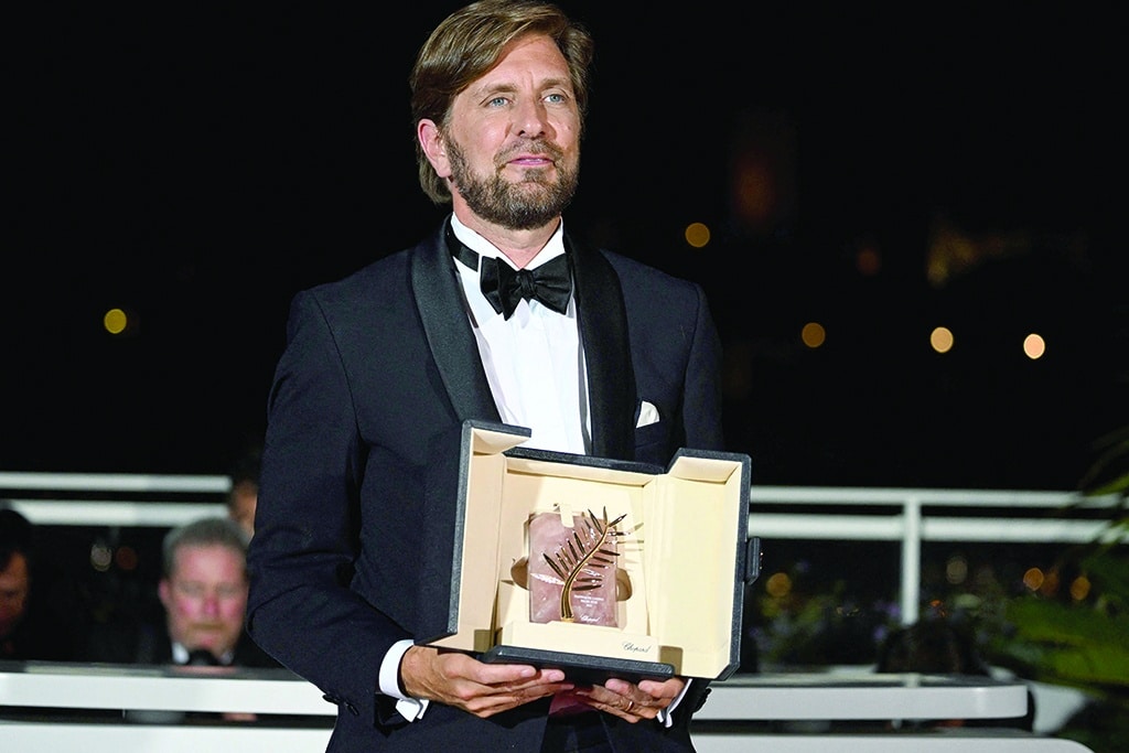 Swedish film director Ruben Ostlund poses during a photocall after he won the Palme d’Or for the film “Triangle of Sadness” during the closing ceremony of the 75th edition of the Cannes Film Festival in Cannes, southern France.—AFP