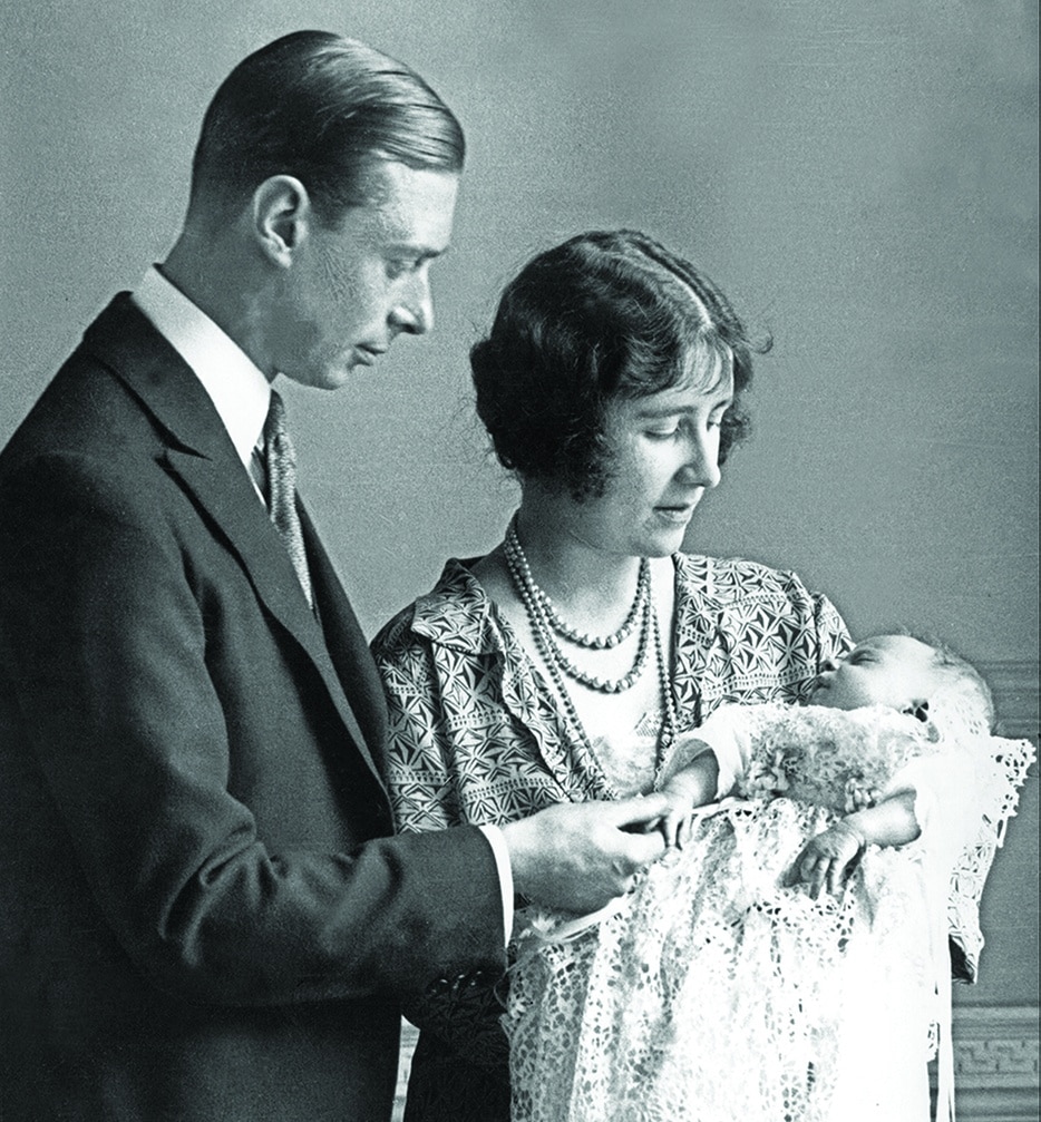 In this file photo taken on in 1926 Lady Elizabeth Angela Marguerite Bowes-Lyon, the daughter of the 14th Earl of Strathmore, the Duchess of York (right), and her husband Prince George, Duke of York, hold their daughter Princess Elizabeth, Britain's future Queen.
