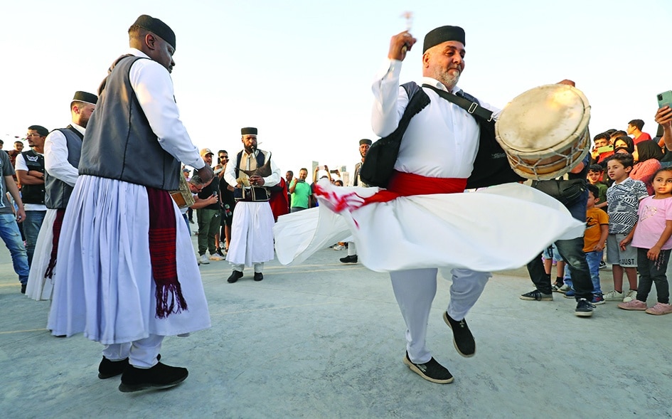 A Libyan folk troupe performs during inauguration of a skatepark, a first in the country.
