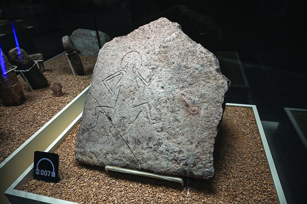 A stone found and displayed at the archaeological site of Gobekli Tepe bears a feminine figure giving birth in Sanliurfa.