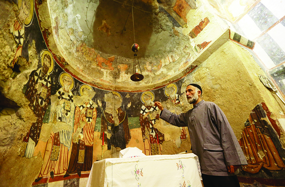 A picture shows Father Jihad Youssef at Deir Mar Moussa Al-Habashi (St Moses the Ethiopian monastery).