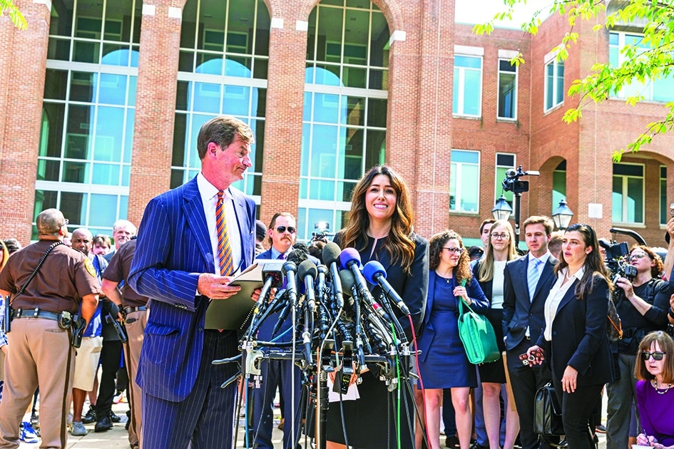 Ben Chew and Camille Vasquez, attorneys for US actor Johnny Depp, speak to reporters outside the Fairfax County Circuit Courthouse.
