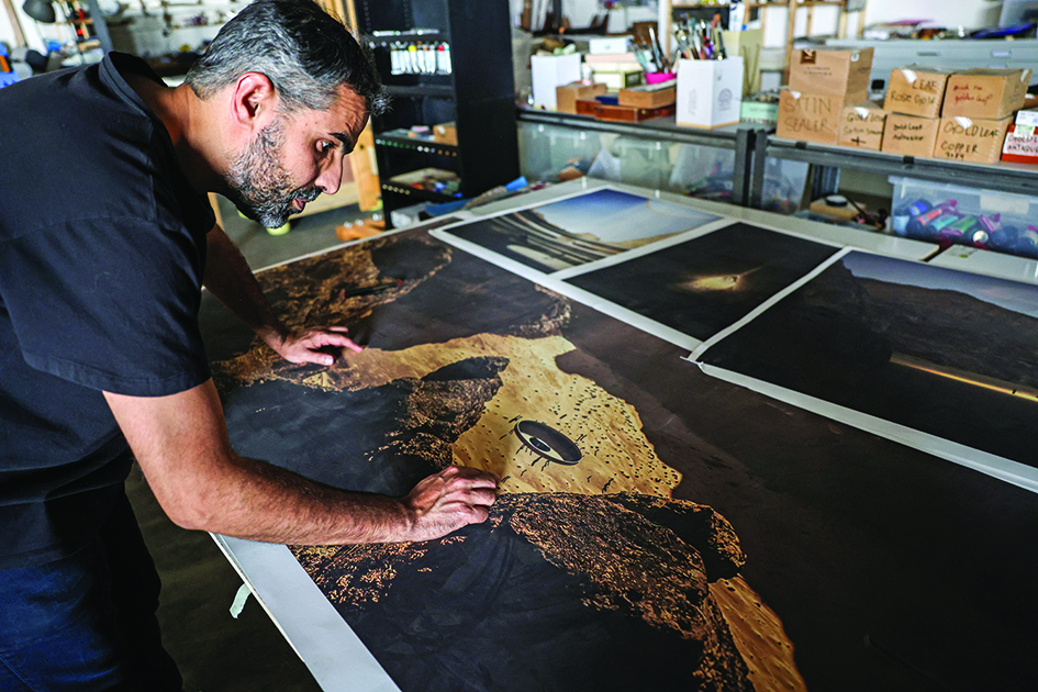 Saudi artist Ahmed Mater works at his studio in the capital Riyadh.