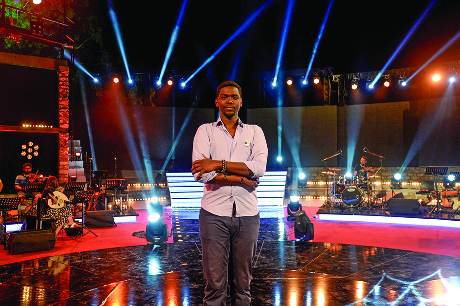 Sudanese leftist activist Ahmed Abuhuraira Hassan poses on the set of the #DDX talent show.