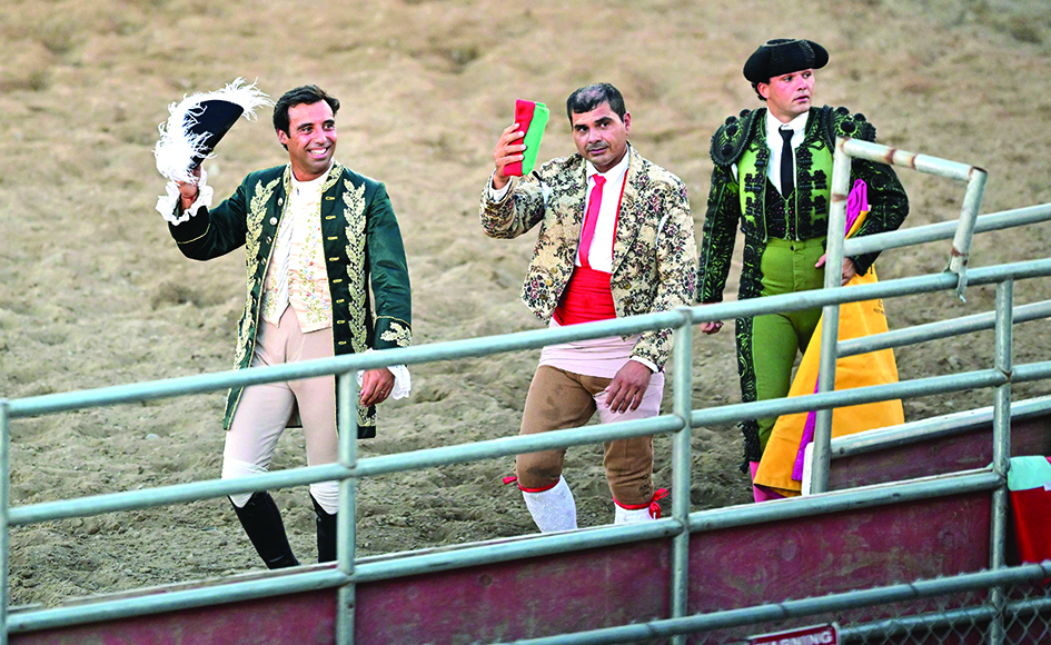 Cavaleiro Joao Soller Garcia tips his hat to acknowledge the crowd during Portuguese-style bloodless bullfights .