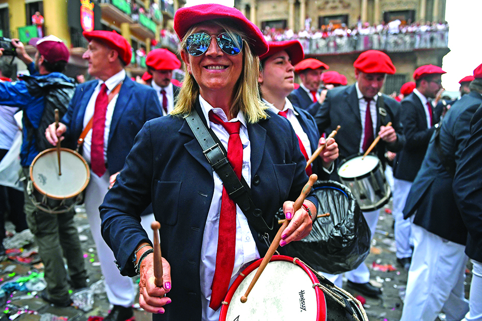 A musician plays drum during the 