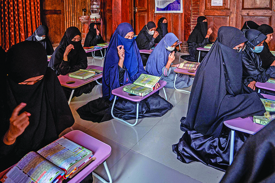 Students study at an Islamic boarding school for deaf children in Sleman.