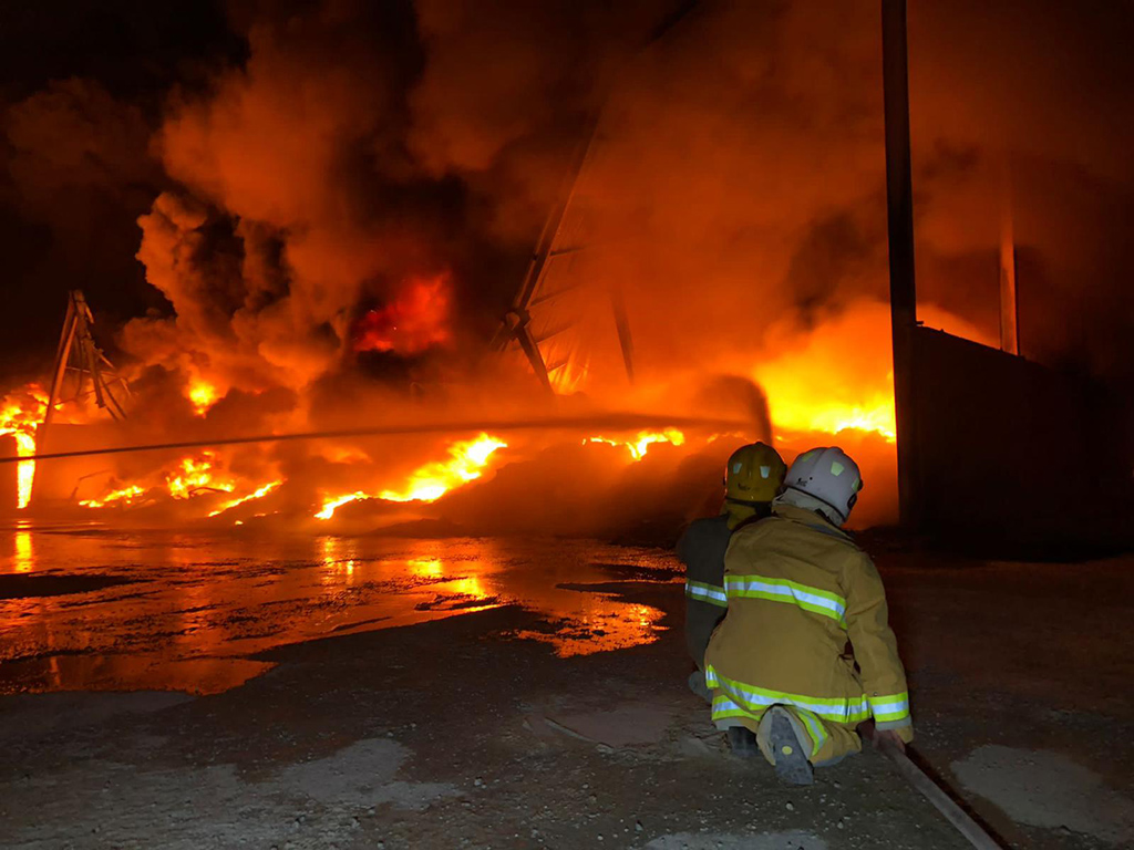 Firemen battle plastic plant, carpenter shop fires