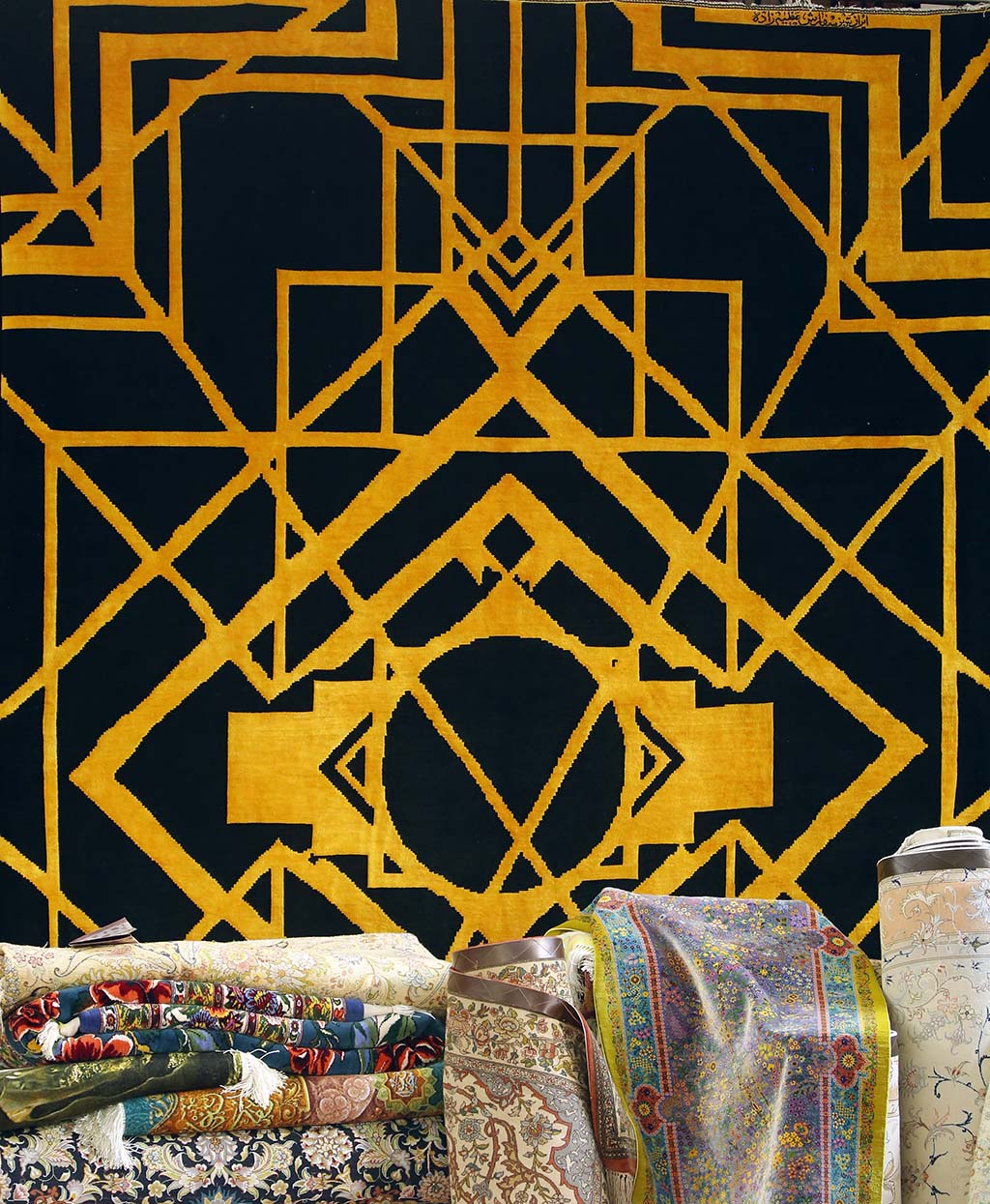 A handmade Tabriz silk on wool carpet with contemporary geometric design in gold hangs. 