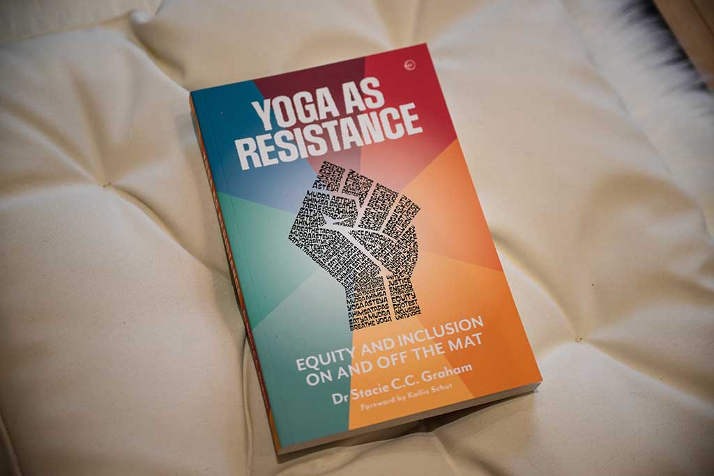 A photograph shows the book