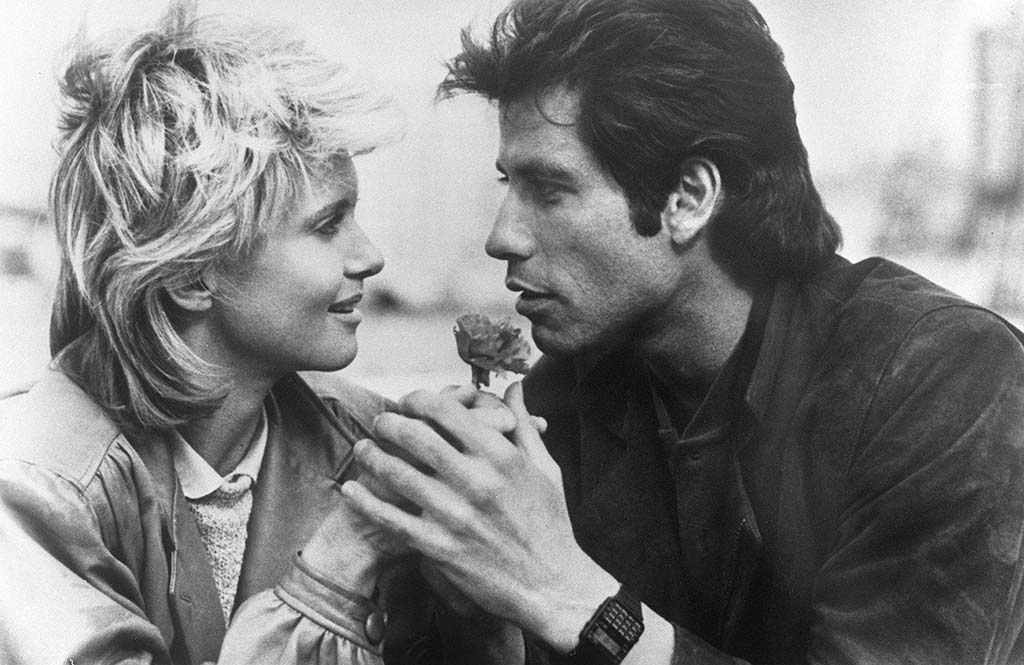 In this file photo taken 1983 US actor John Travolta and British-Australian actress and singer Olivia Newton-John shoot the film 