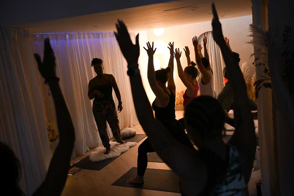 Yoga teacher and author Stacie Graham gives a yoga session at the studio 