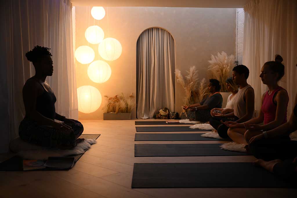Yoga teacher and author Stacie Graham gives a yoga session at the studio