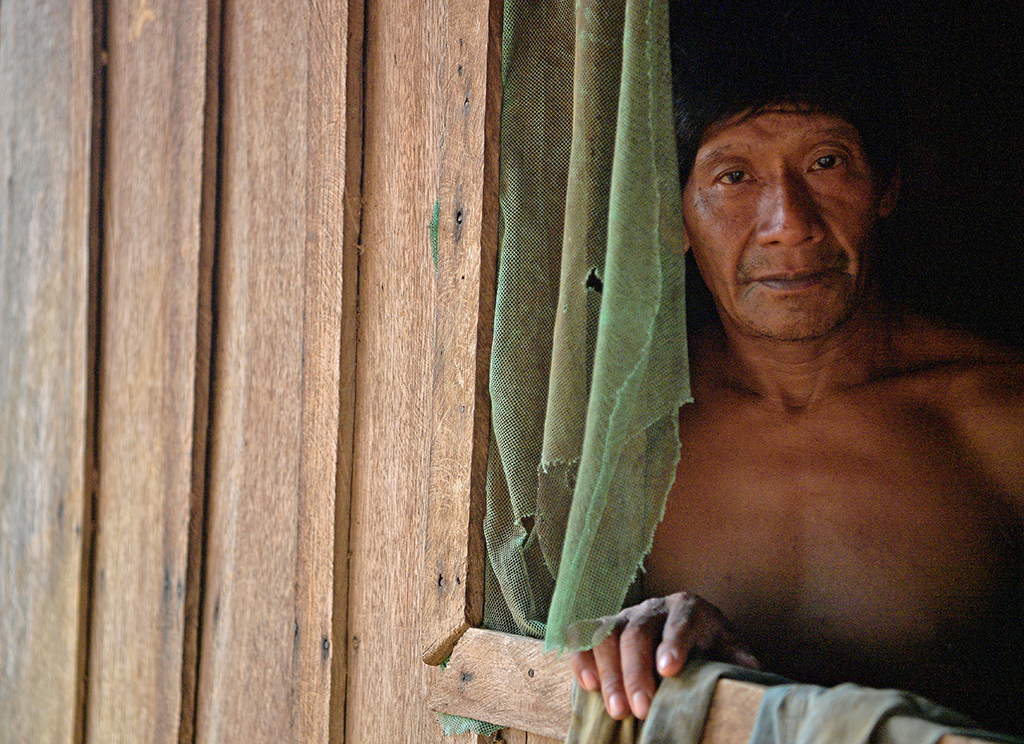 In this file photo a member of Uru Eu Wau Wau tribe poses in the tribe's reserve in the Amazon, south of Porto Velho, Brazil. 