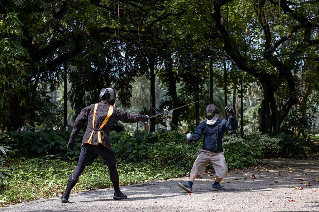 This picture shows a member of the Gwaith-i-Megyr group practicing sword-fighting techniques known as Historical European Martial Arts (HEMA) at a park in Jakarta.