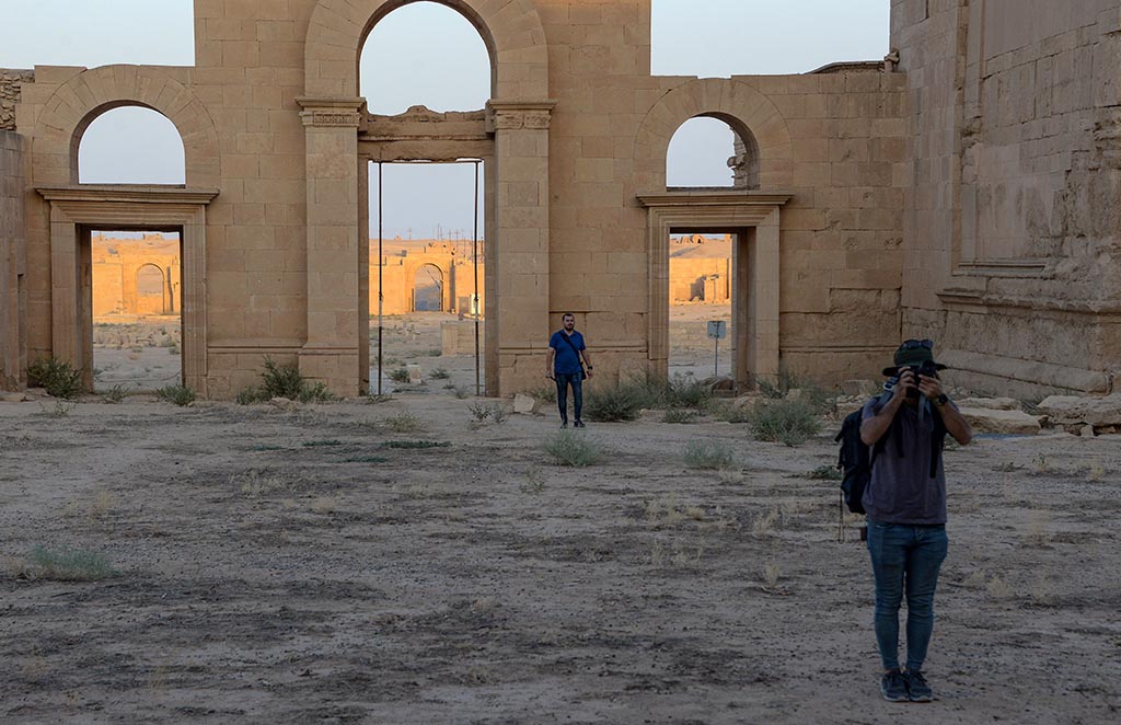 Tourists visit the ancient city of Hatra in northern Iraq.