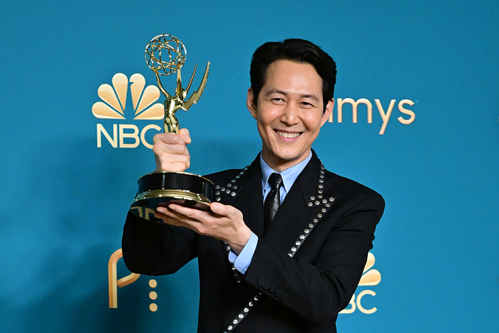 South Korean actor Lee Jung-jae poses with the award for Outstanding Lead Actor In A Drama Series for 