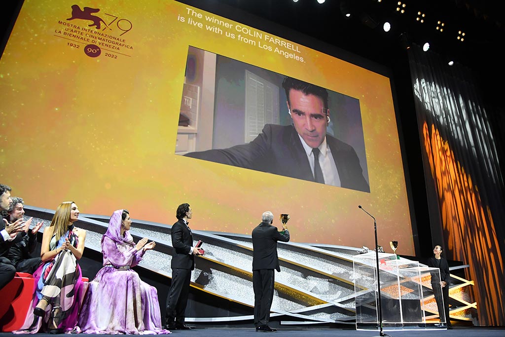 Irish actor Colin Farrell, connected on screen via a video link from Los Angeles, acknowledges receiving the Coppa Volpi for Best Actor for