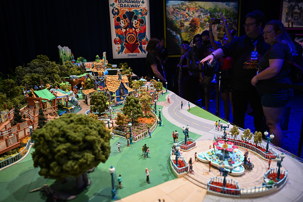 Attendees view a model of a reimagined Mickey's Toontown during the Walt Disney D23 Expo.