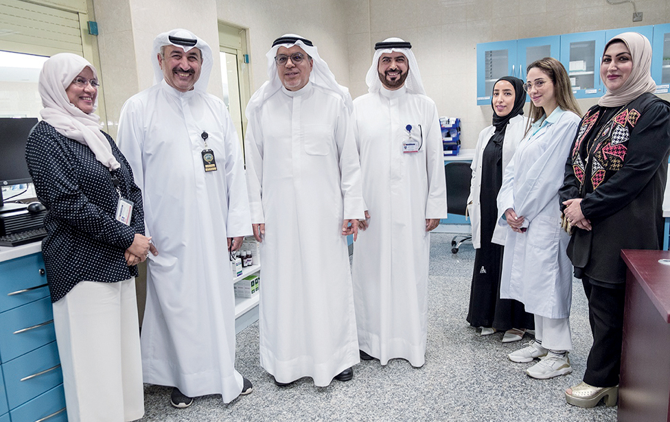 KUWAIT: Dr Khalid Al-Saeed interacting with the medical staff at Abu Futaira clinic.