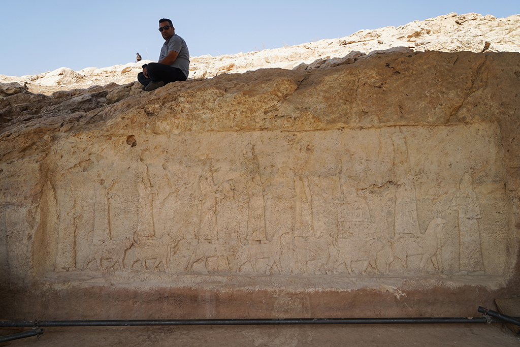 A picture shows a carved plaque lining an ancient irrigation canal dating back to Assyrian times, in the archaeological site of Faydeh (Faida). 