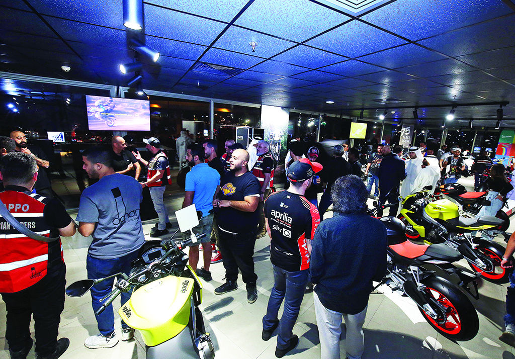 KUWAIT: Bike enthusiasts gather at the showroom during the opening