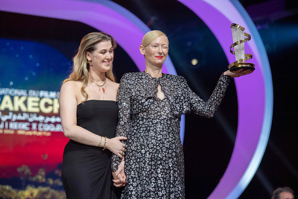 British actress Tilda Swinton (right), receiver of a tribute trophy, and her daughter actress Honor Swinton Byrne.