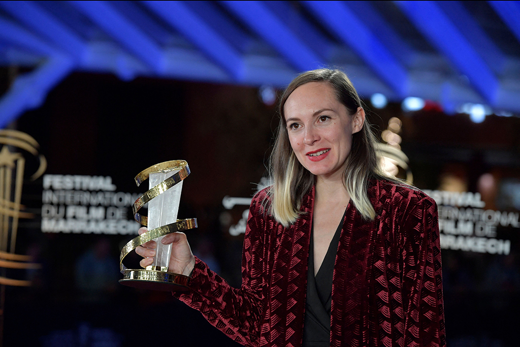Swiss director and screenwriter Carmen Jaquier poses with her Best Direction Award.