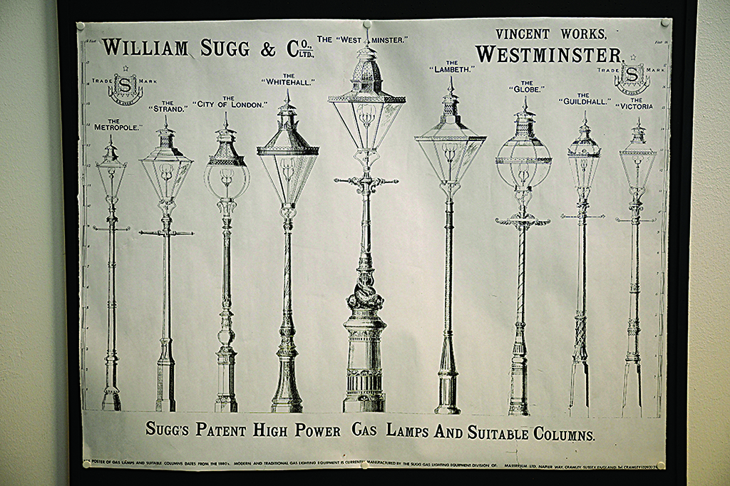 A poster displaying different types of gas-powered lamps is pictured at the British Gas repair centre in London. 