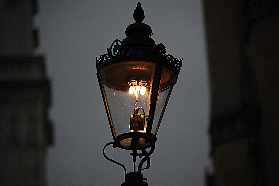 A gas-powered lamp is seen alight near Westminster Abbey in central London.