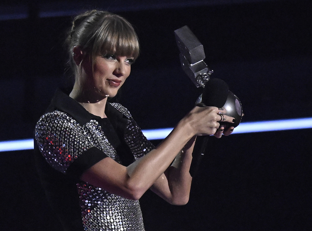 US singer-songwriter Taylor Swift poses with the award for 