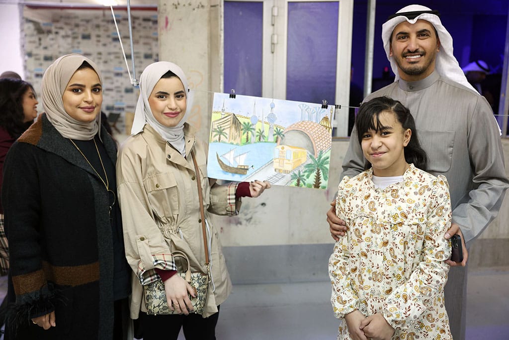 Photo shows the second-place winner Najla Alazemi (center) in the special needs category.