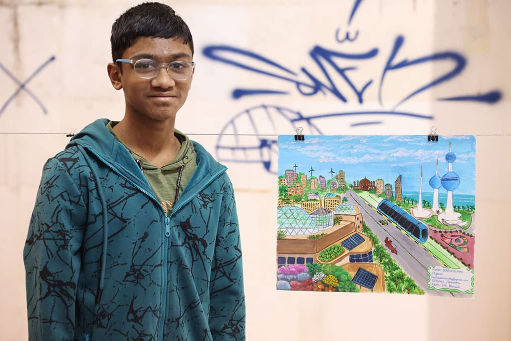 Photo shows the third-place winner Sivesh Senthilkumar in the (12-14 category) .