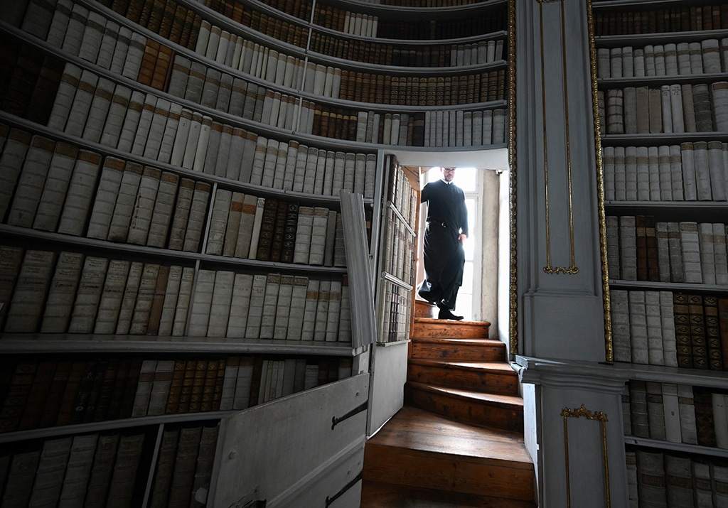 Father Maximilian Schiefermueller is seen in the library of the Benedictine Abbey in Admont, Austria.