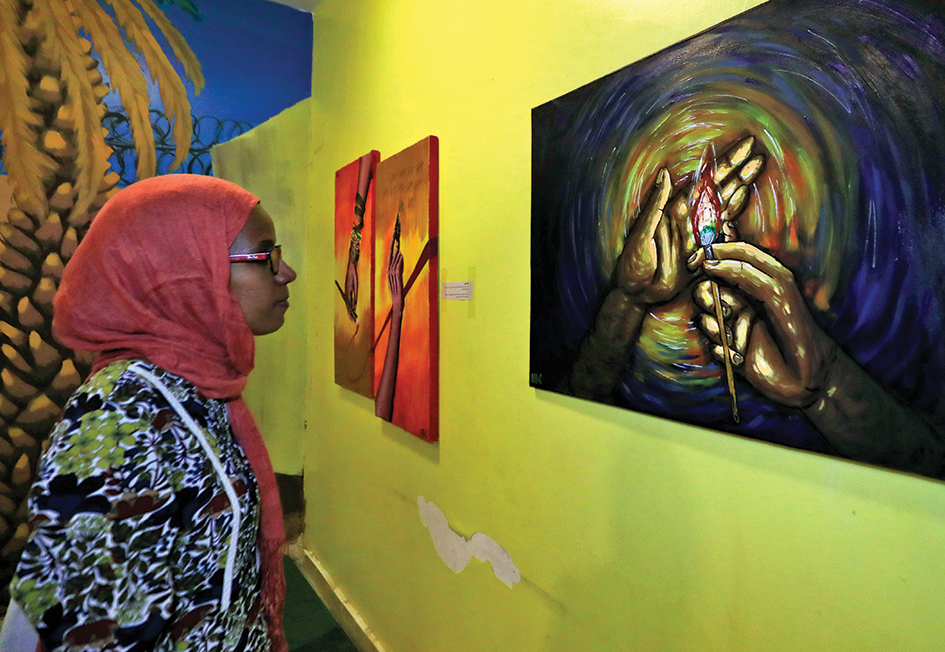 Sudanese visit a Rastafari art exhibition in Sudan's capital Khartoum.
