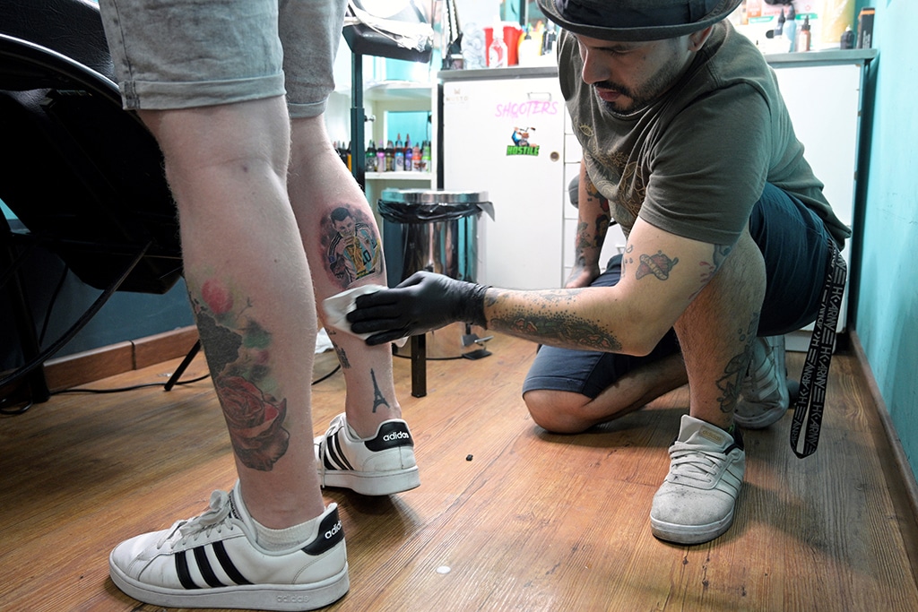 More than skin deep: Fans line up for Messi tattoos